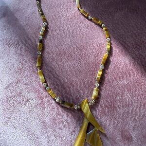 Elegant Gold and Brown Necklace
